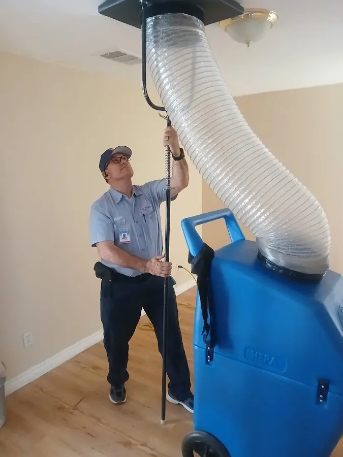 Mini Split Installation technician using HEPA equipment in Farmers Branch